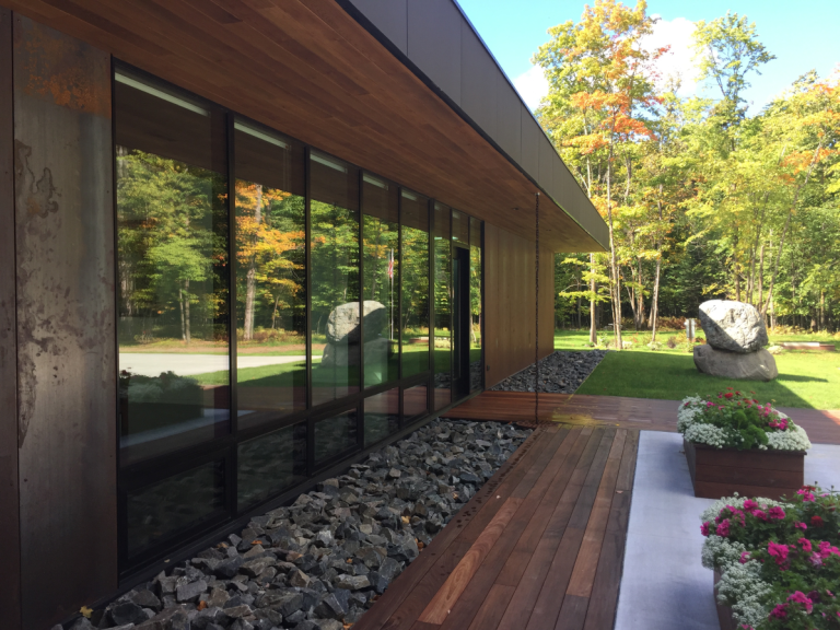 Full ceiling to floor length fiberglass windows, with heritage glass.